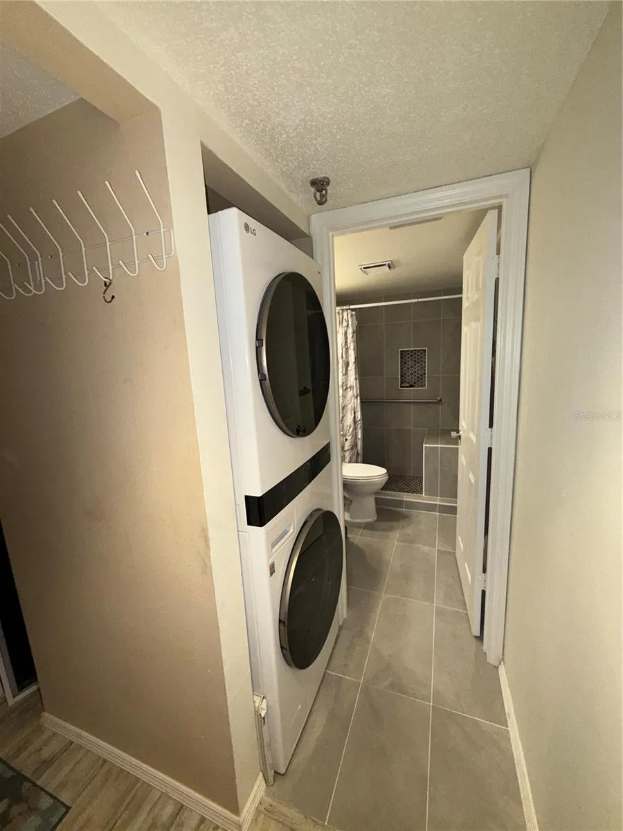 MASTER WALKIN CLOSET &amp; LAUNDRY