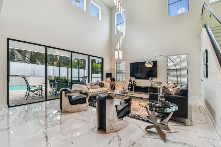 Grand room with 16ft sliding glass doors to backyard oassis
