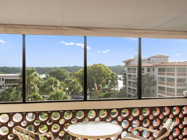 Private Screened-In Balcony with Lake Views