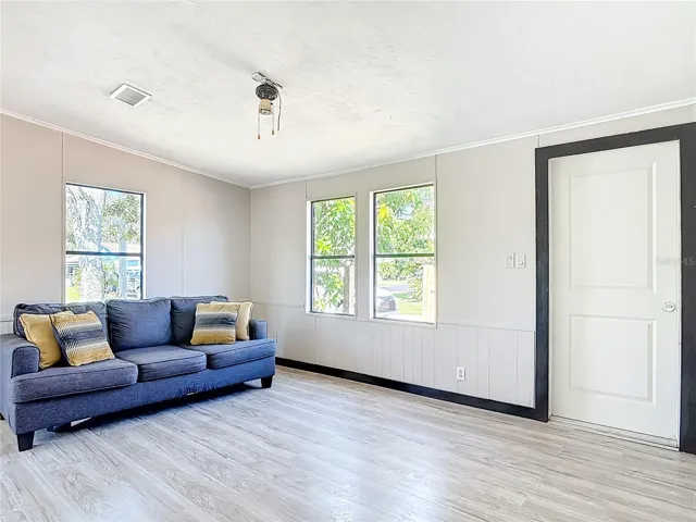 Living room has a side door