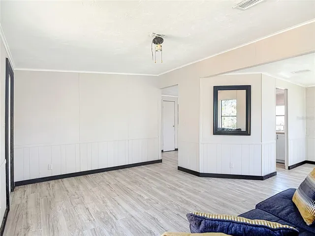 Living room opens to the kitchen