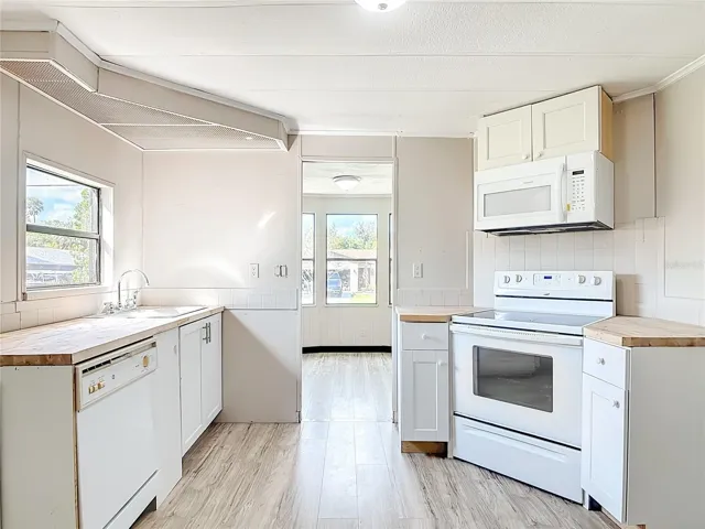 kitchen has dishwasher and microwave