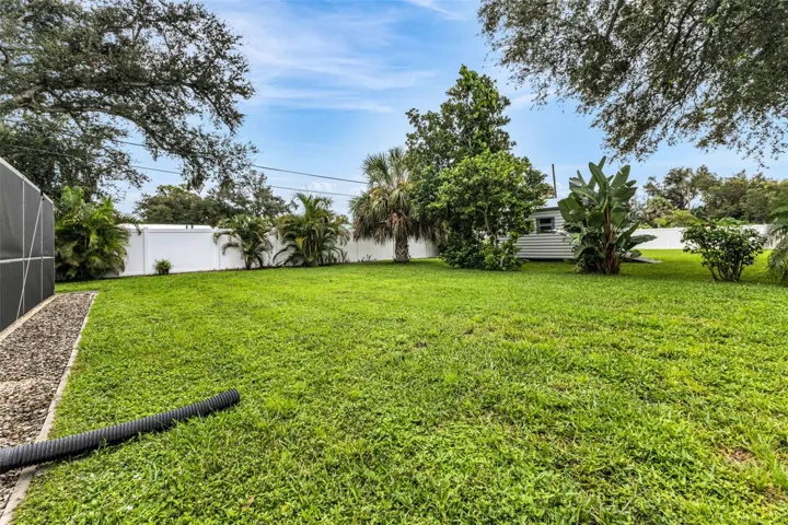 Situated on a lushly landscaped lot
