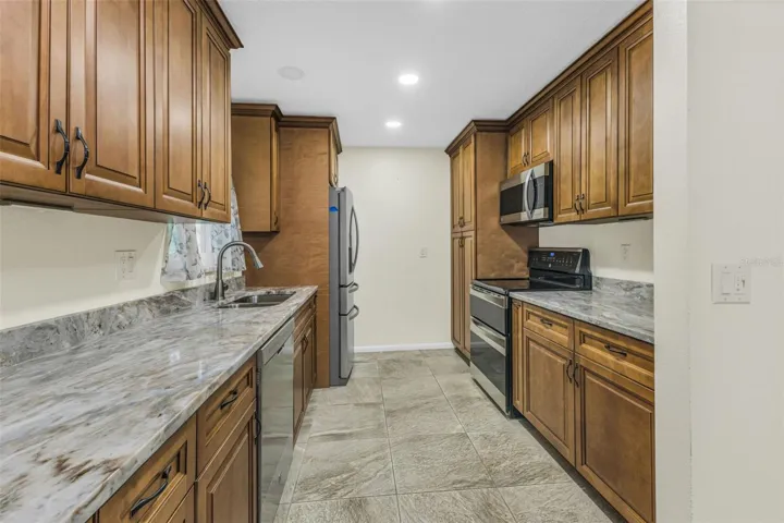 Large pantry, double sinks granite counters and soft close wood cabintry will pull out shelves