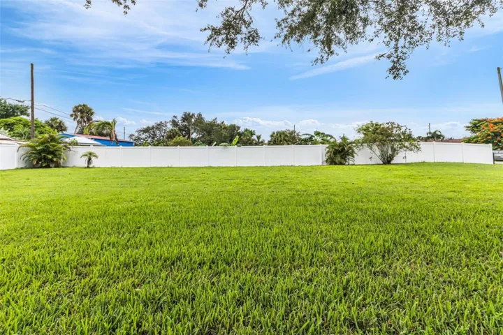 Fully fenced 1/2 acre lot with on street access