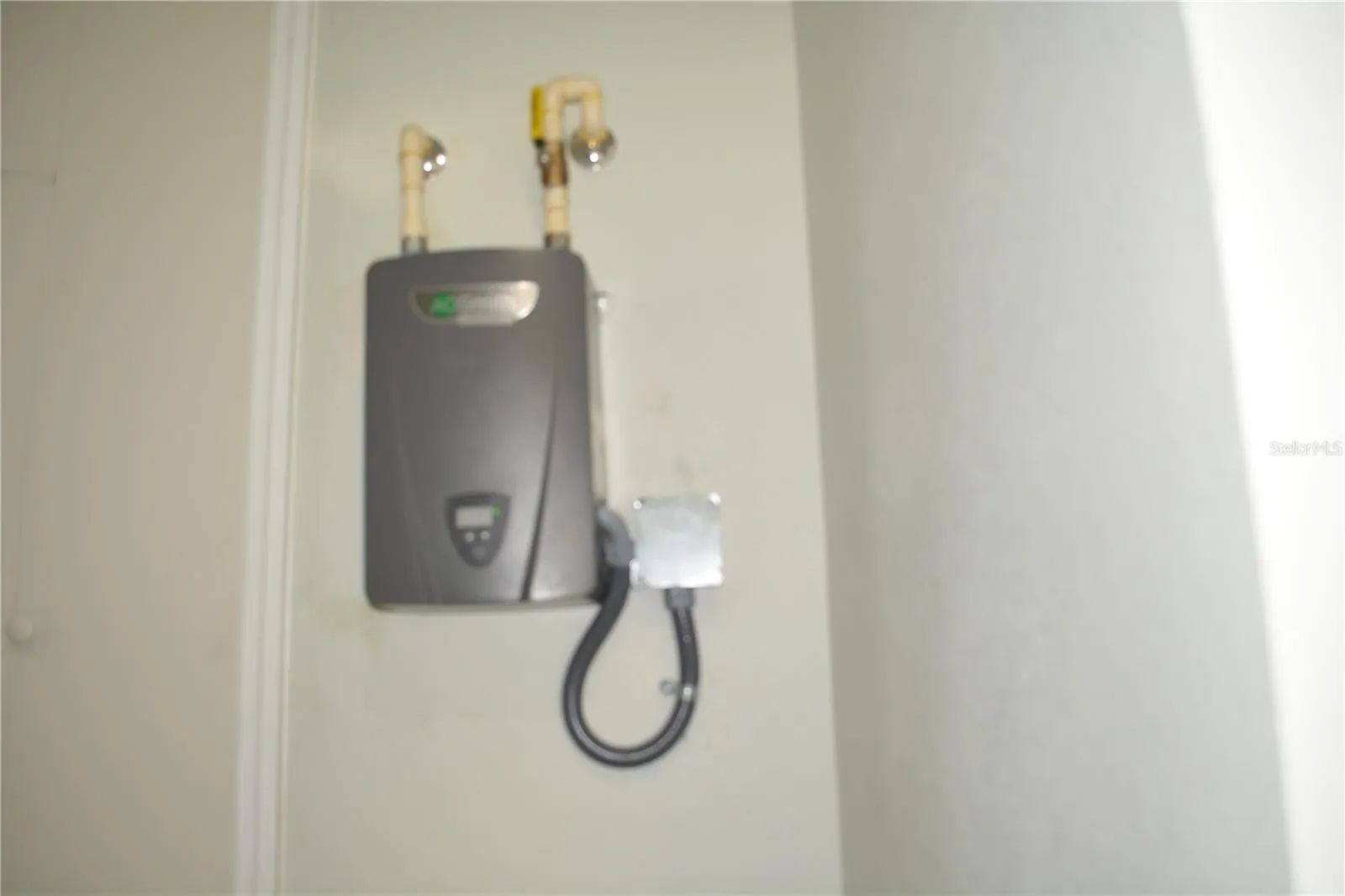 Tankless hot water heater to save even more space