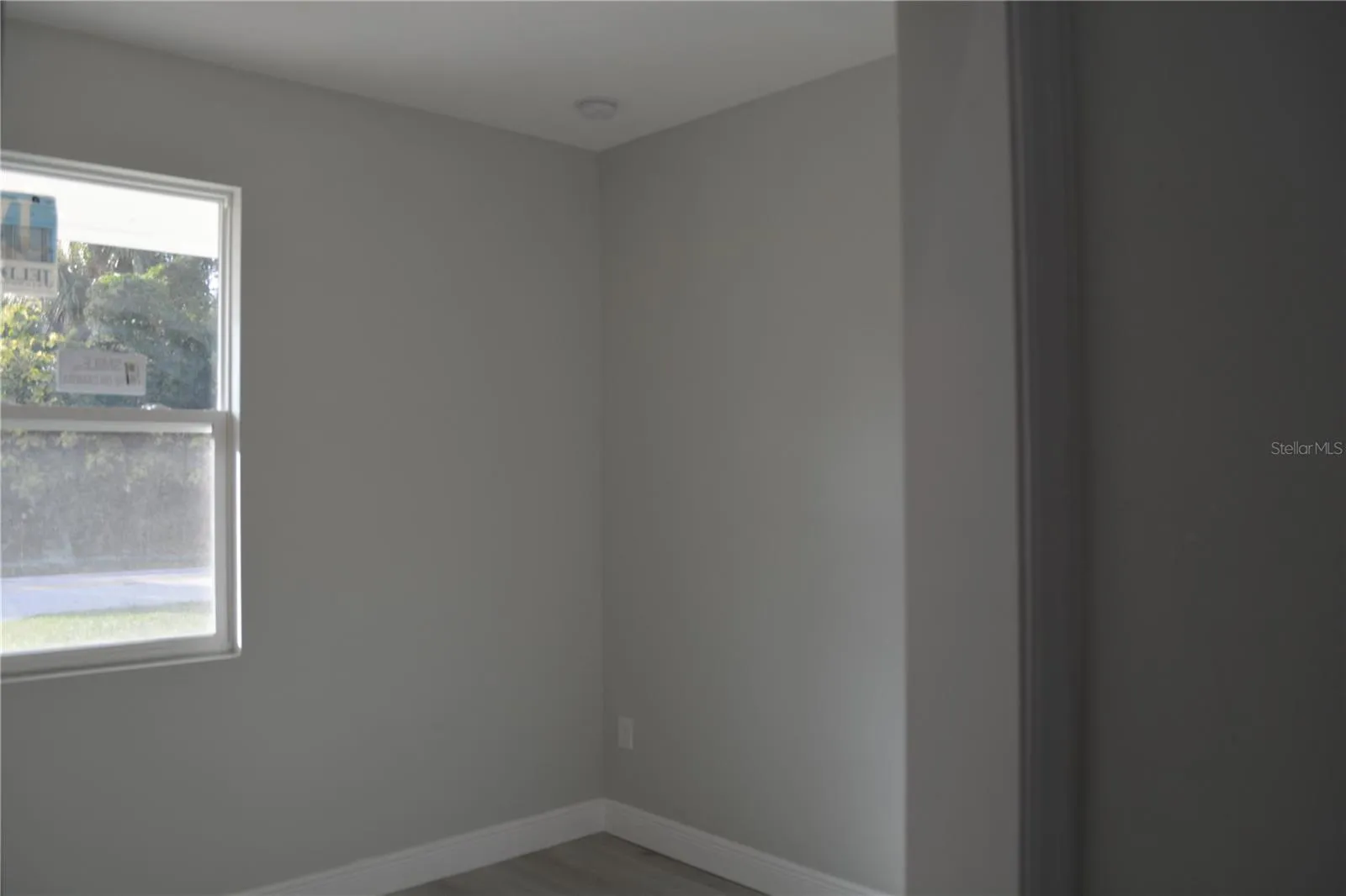 Front bedroom with luxury vinyl