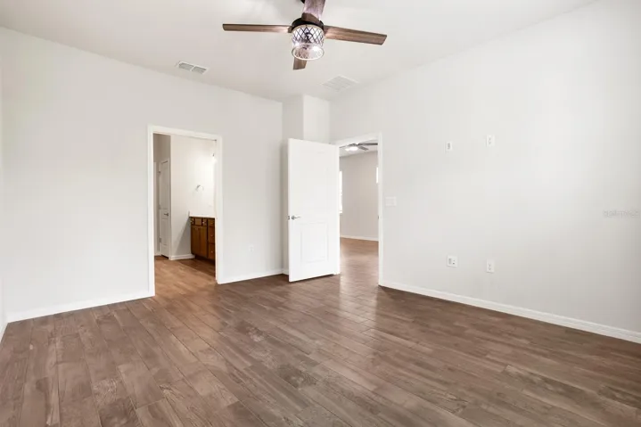 Master bedroom entrance to the ensuite bathroom.Split bedrooms.