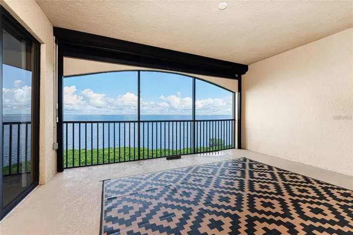 Large lanai has a view of the harbor and has hurricane protection