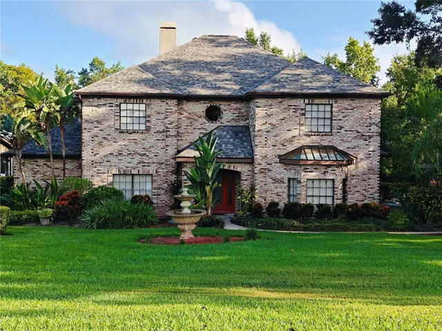 Stunning brick home with large front yard