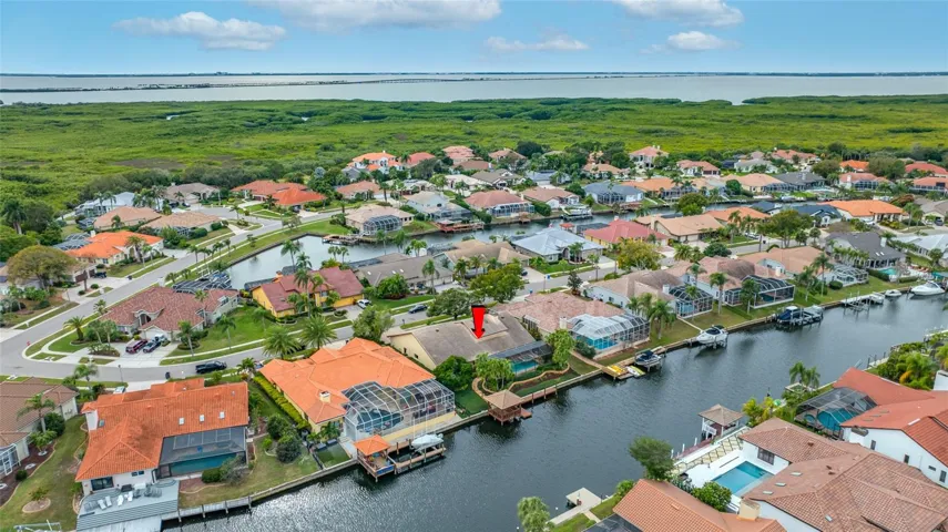 Aerrial view showing home and Tampa Bay in background