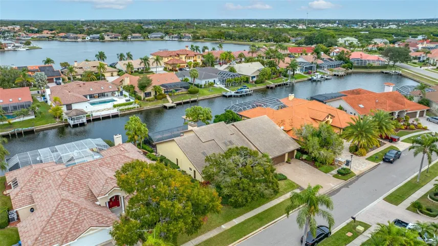 Aerial view showing home and big lake in background