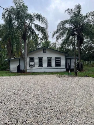 Front of Home with Large Parking Area