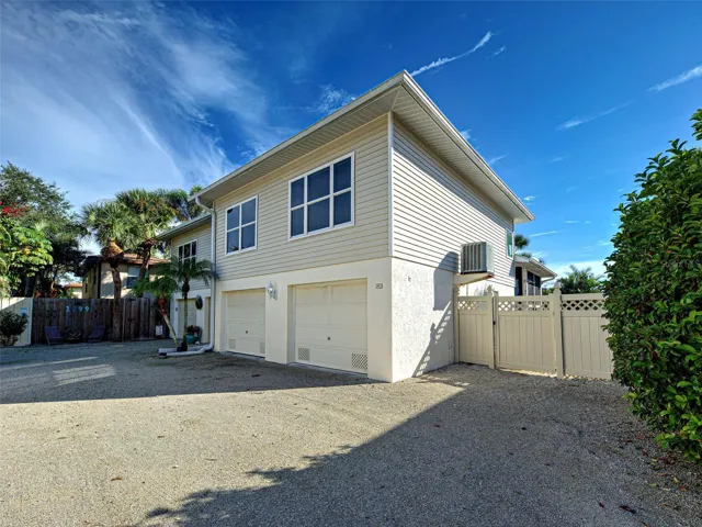 The front view of this lovely townhouse with a large two car garage.
