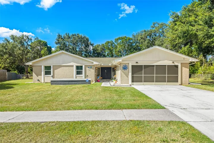 4 Bed / 2 Bath / 2 Car Garage on 1/2 an acre!  No HOA!  No Deed Restrictions!  Fenced lot!