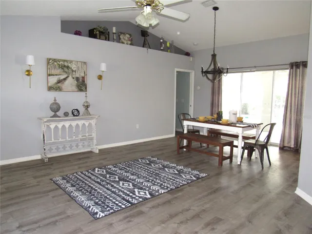 Dining room with triple sliders to lanai