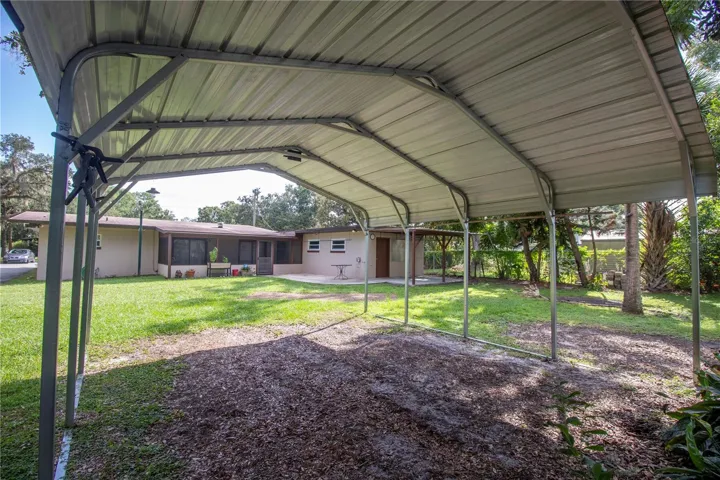 Carport for vehicle parking.