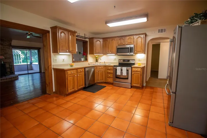 Kitchen full view and room for a Dinette set.