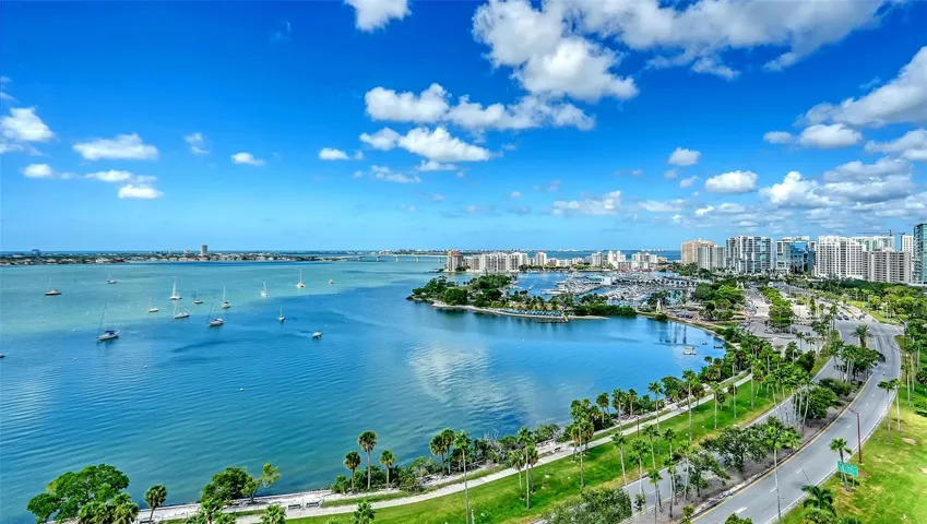 Claim your front-row seat to nature’s masterpiece! With nearly 2,000 square feet of wraparound terrace, enjoy breathtaking views as Sarasota’s shoreline embraces the Bay and the vibrant energy of Downtown unfolds before you.
