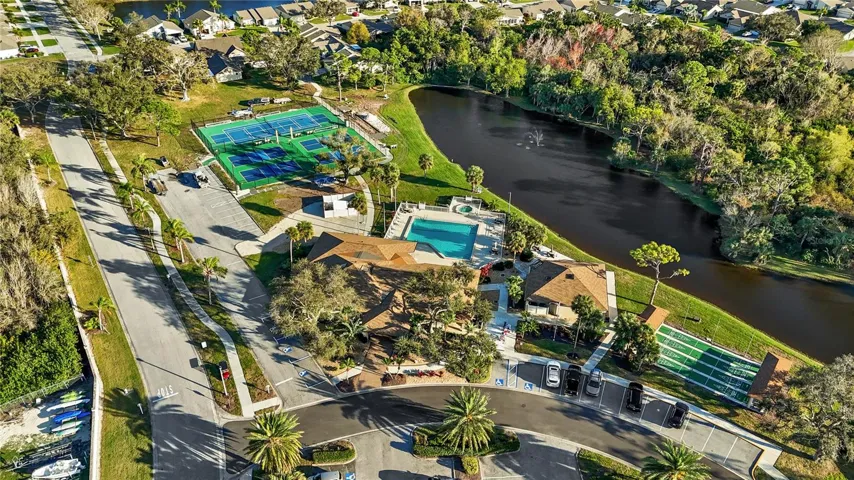 FRONT AERIAL VIEW OF THE CLUBHOUSE AND POOL AREA