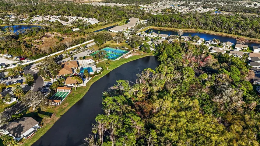 AERIAL VIEW TOWARDS THE CLUBHOUSE AND POOL AREA ON THE LEFT