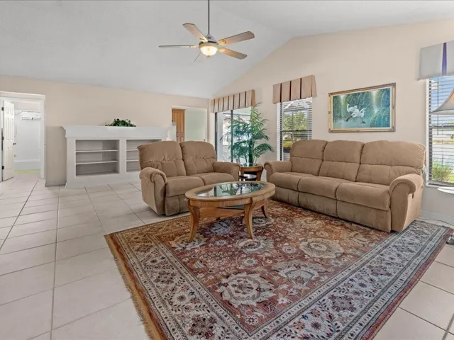 THIS SPACE HAS a VAULTED CEILING AND CERAMIC TILE FLOORS.