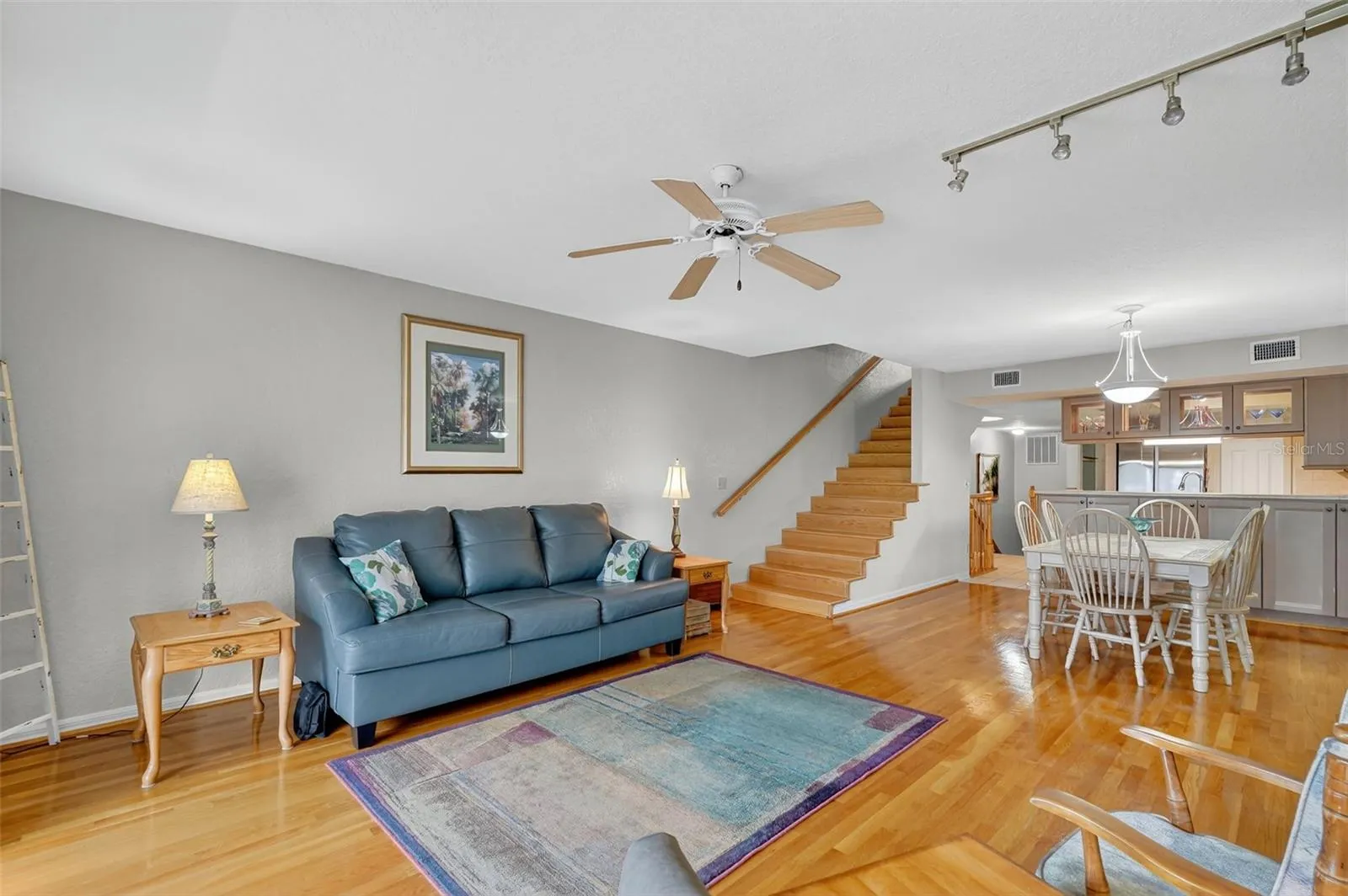 Living room opens to dining and kitchen for easy entertaining