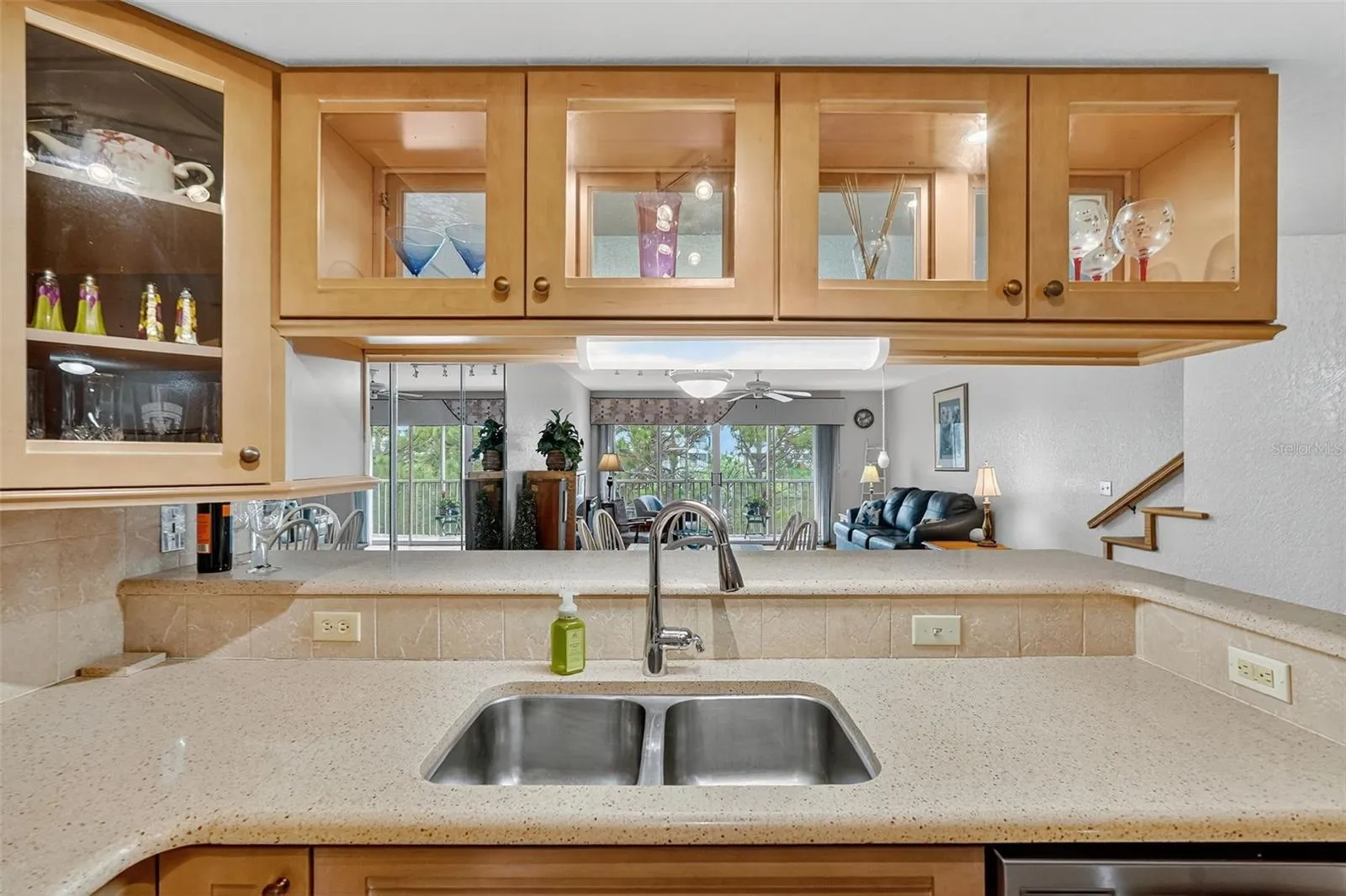 Breakfast bar opens to the living and dining areas