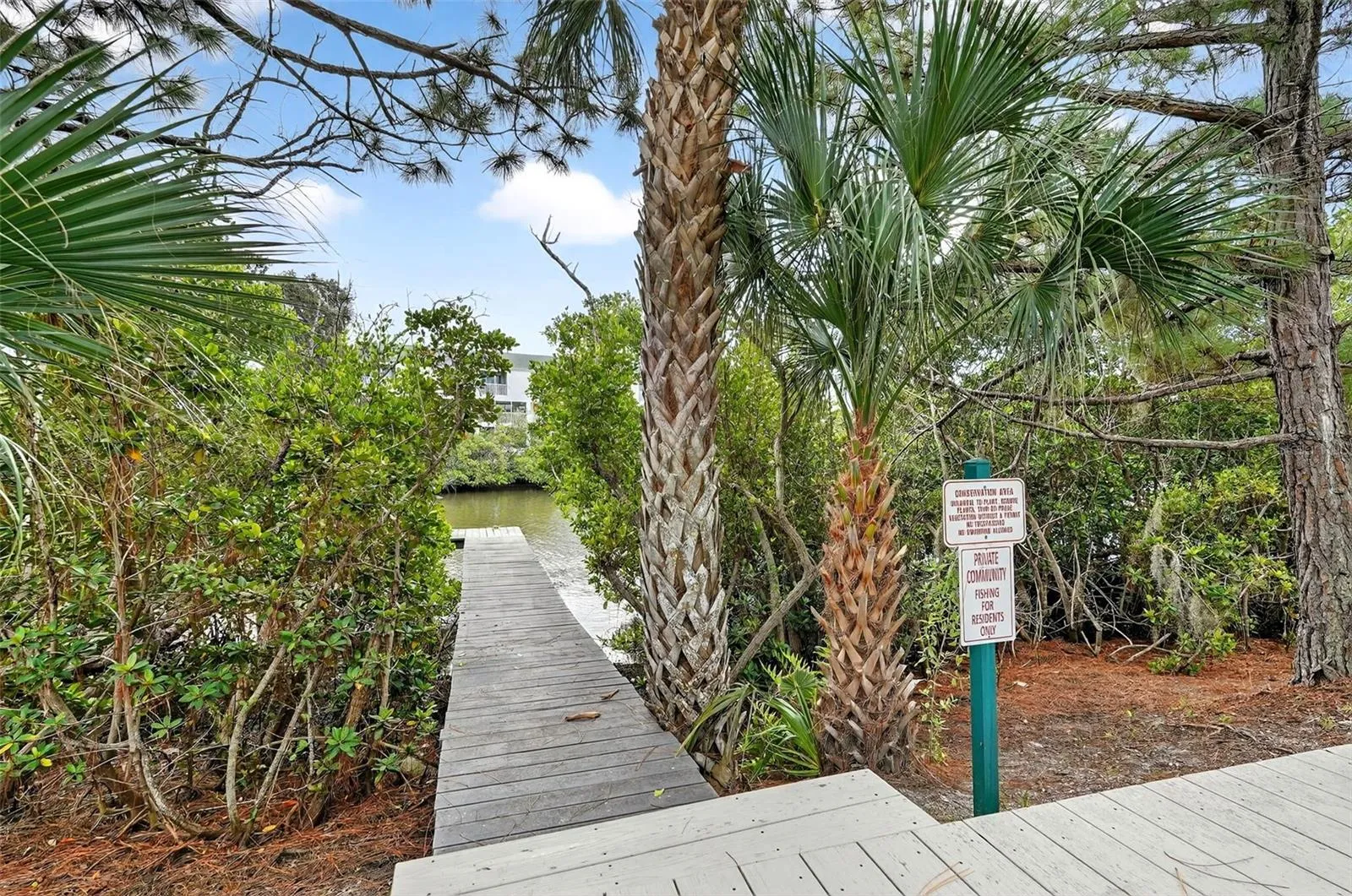 Community dock just steps behind 14879 Seminole Trail