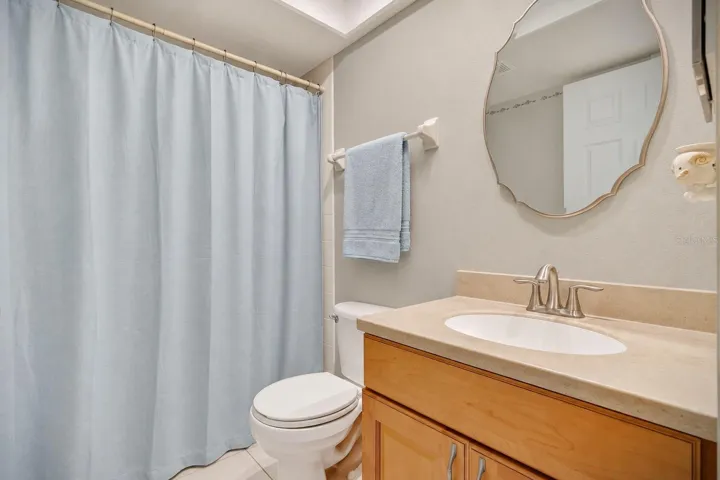 Guest bath with refreshed neutral finishes