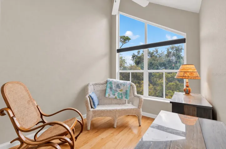Bright bonus area with oversized window and nature views
