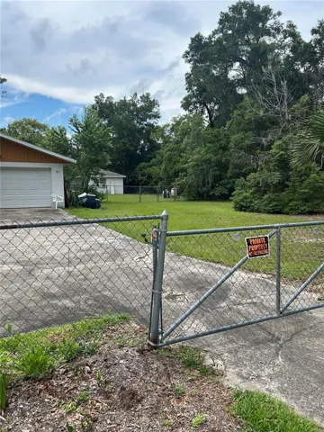 Front of house showing detached garage facing north.