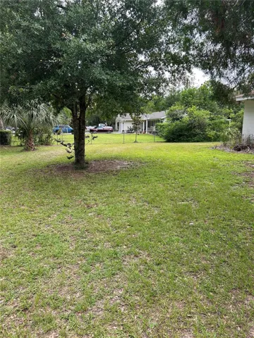 facing west showing neighbors house.