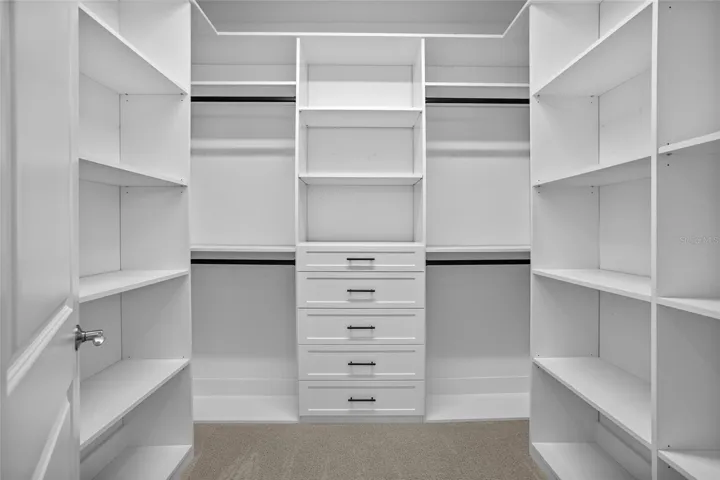 Walk-in closet with built-ins in Primary on 2nd floor