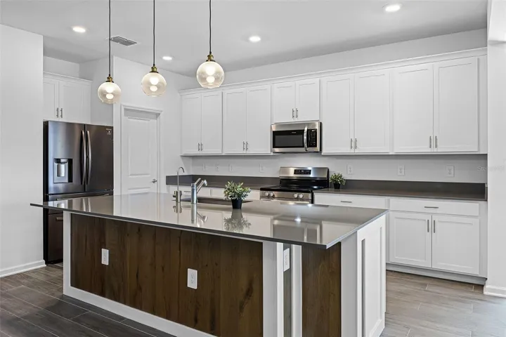 Spacious kitchen with island and walk-in pantry
