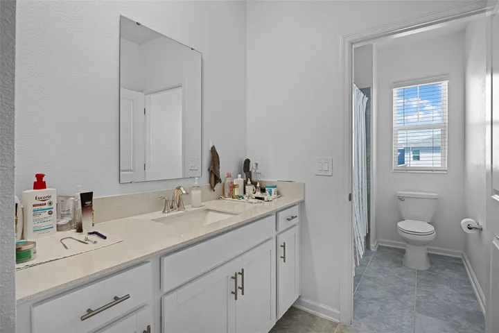 2nd floor bathroom with tub and shower