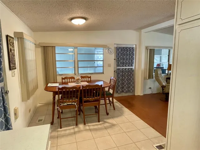 From kitchen, looking into the dining area. The door shown straight ahead leads to the Florida room