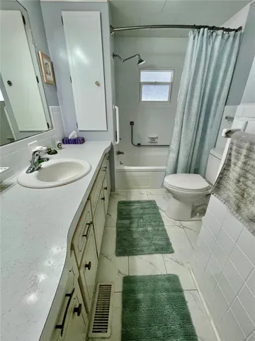 Hall bath, first door to the left walking down the hall