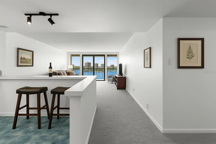 The water views are captivating from the moment you walk into your home.  This photo has been staged.