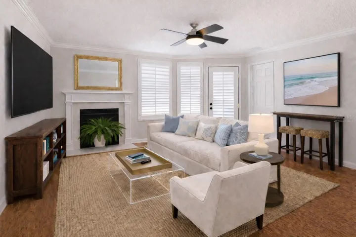 Virtually staged/altered photo to envision a living area furniture arrangement.