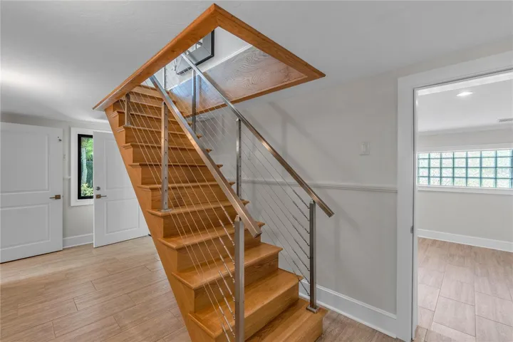 Stairs to 2nd Floor Next to Elevator
