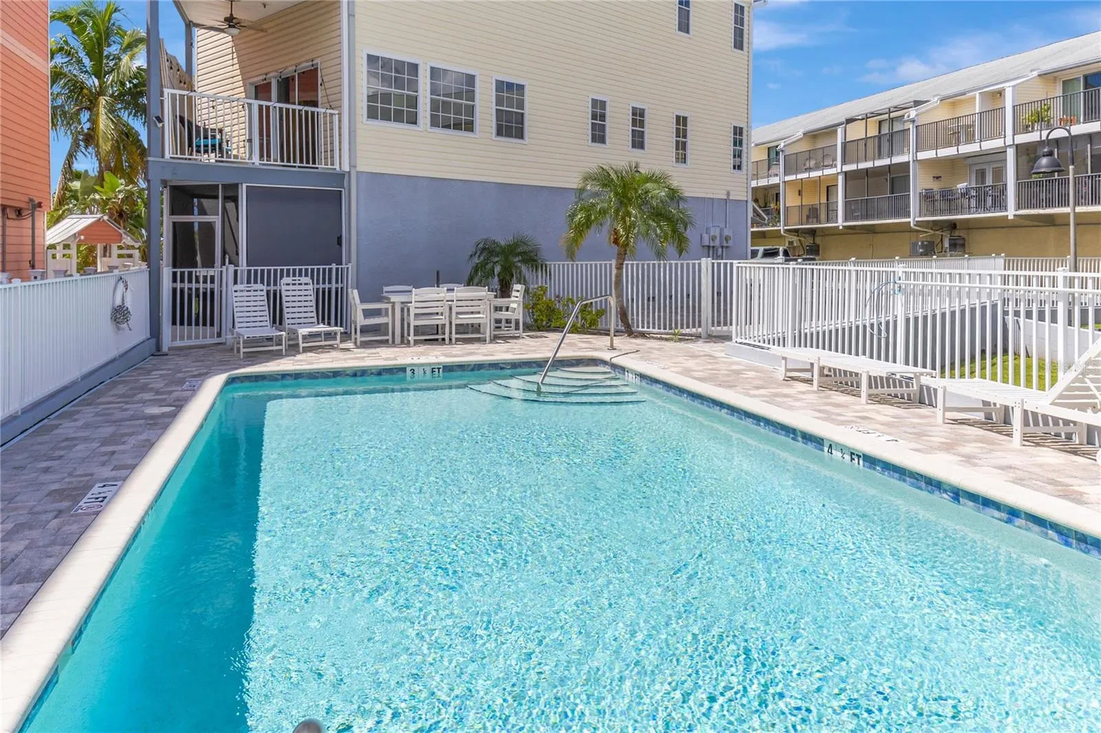 Relax at your quaint communities private pool oasis.