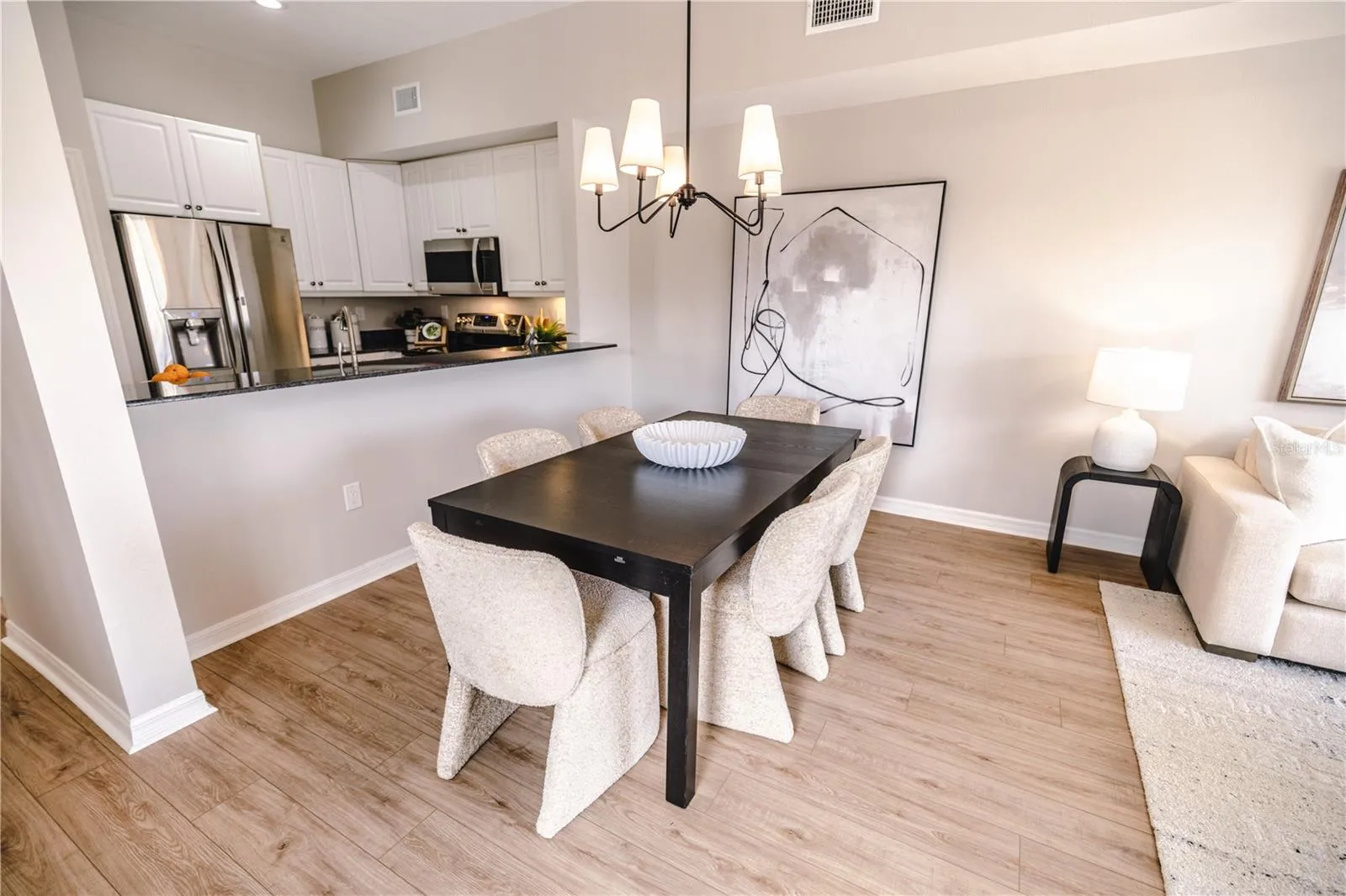 Bright, functional kitchen with open flow for entertaining.