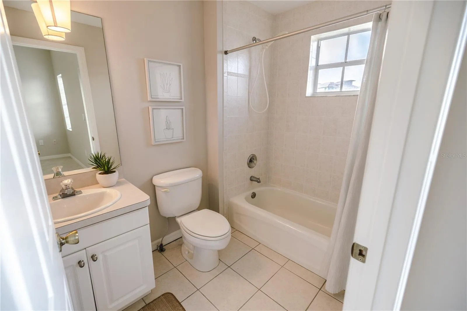 Third floor guest suite with spacious closets and a serene ensuite bath.