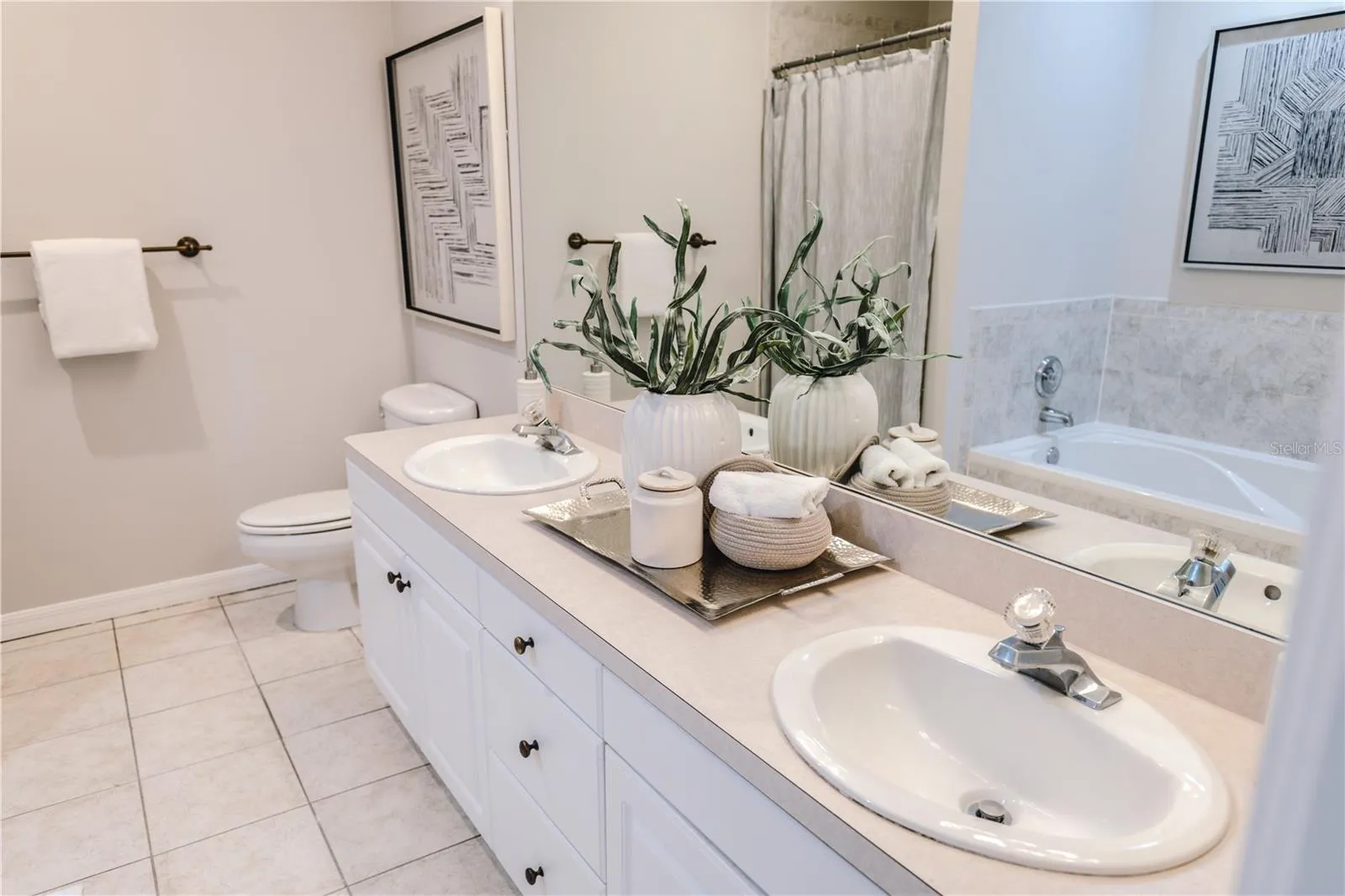 Dual sinks, soaking tub and separate shower- designed for comfort.