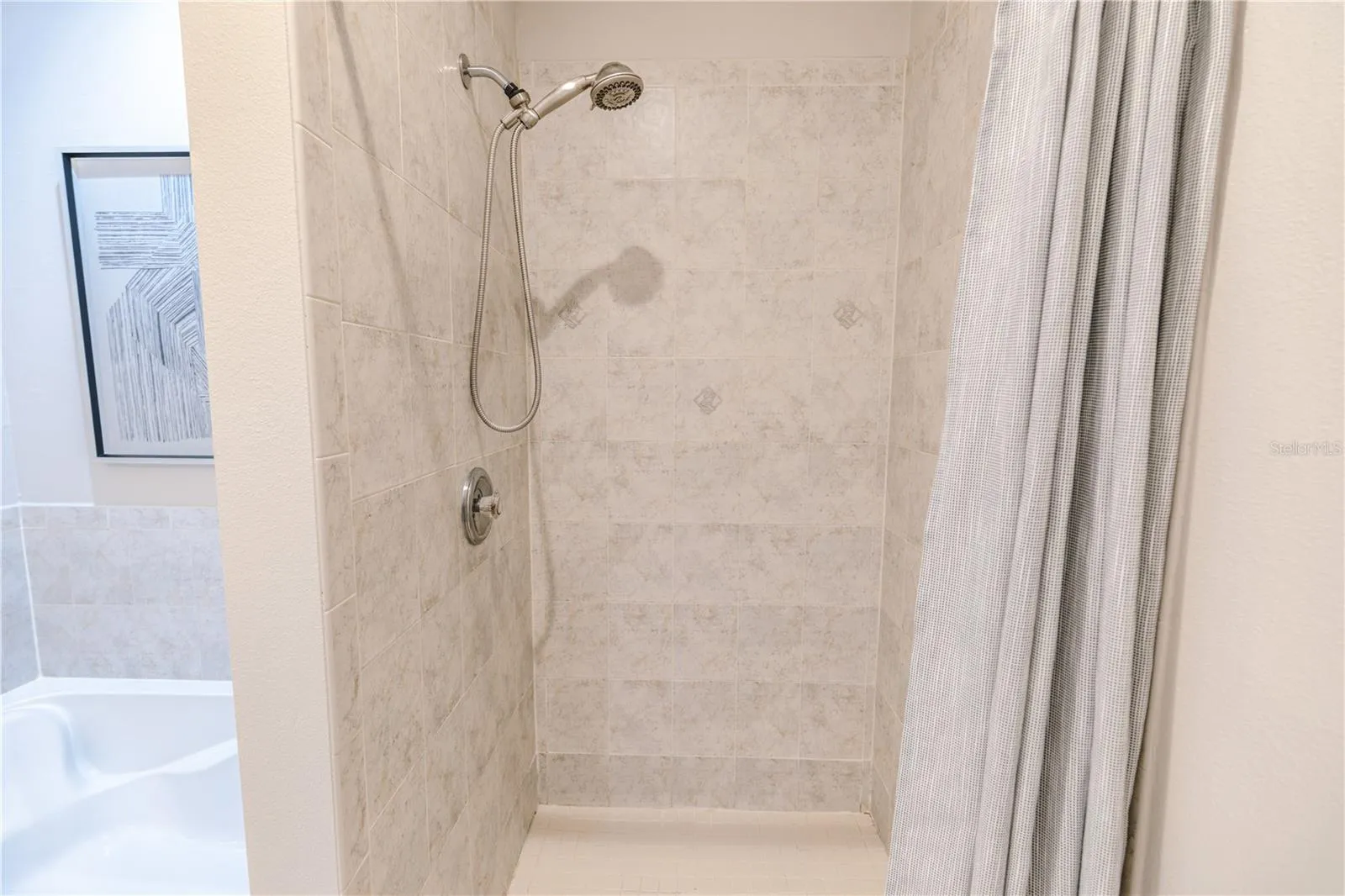 Dual sinks, soaking tub and separate shower- designed for comfort.