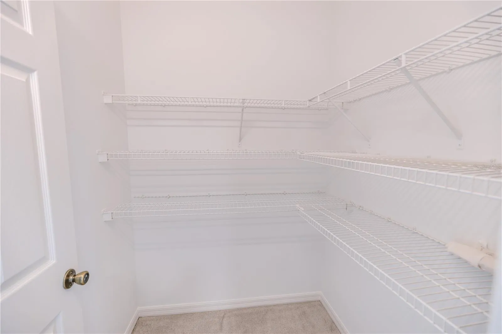 Third floor guest suite with spacious closets and a serene ensuite bath.