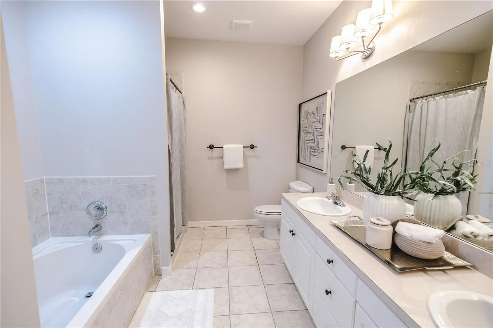Dual sinks, soaking tub and separate shower- designed for comfort.