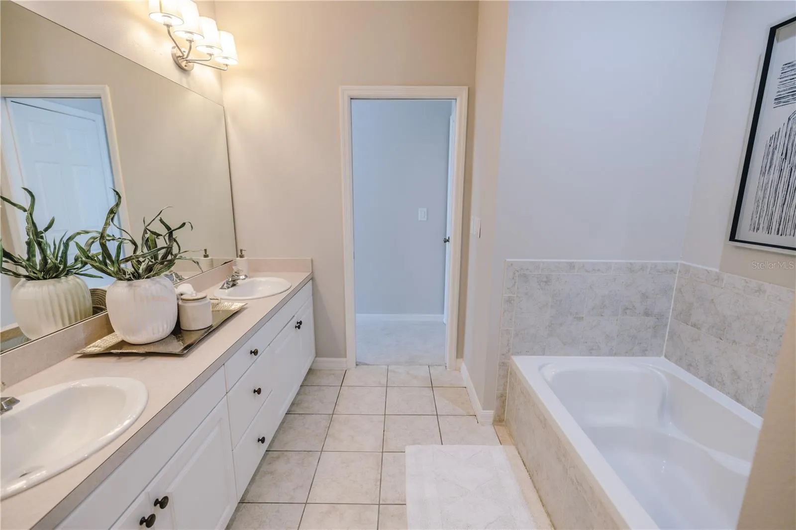 Dual sinks, soaking tub and separate shower- designed for comfort.