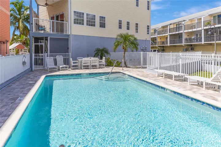 Relax at your quaint communities private pool oasis.